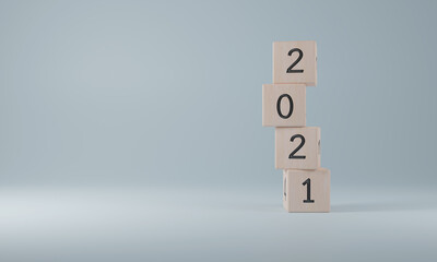 2021 on wooden cubes. New year concept