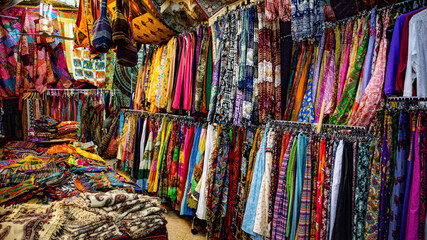 Arab store of bright clothing made of natural fabrics in the shopping malls of Jerusalem