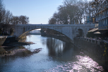 Fototapeta na wymiar View at the Sochi River and Riversky Bridge