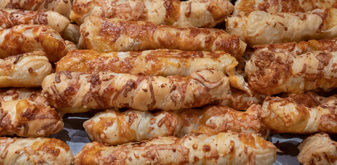 Cheesy  breadsticks  on the Tel Aviv bakery display. 