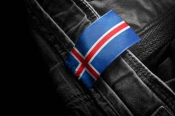 Tag on dark clothing in the form of the flag of the Iceland