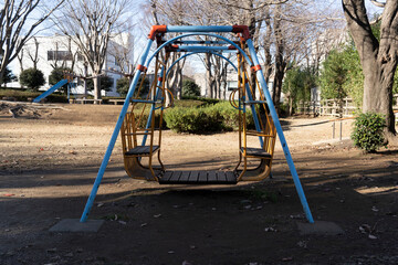 Fototapeta na wymiar Playing equipment: Swing in a park, Japan