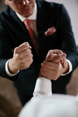 Close up of men handshake in office. Successful teamwork. Business people in office..