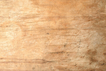 texture of a old brown wooden cutting board, full frame, backdrop for the designer