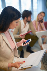 A group of young business people at a meeting in an apartment taking a break after hard work. Business, meeting, people