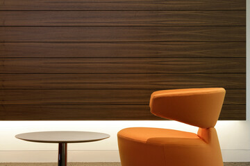 Orange leather chair and table in an office