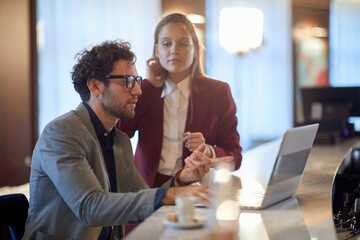Two colleagues chatting on a break