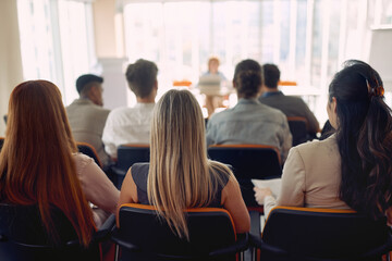 Group of business people listening to a lecture at seminar. People, company, job, business concept.