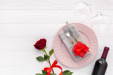 Romantic dinner concept.Romantic valentine's day table setting with wine, glasses and red box