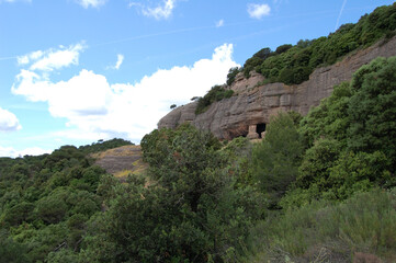 Panorama of the mountains and forests of La Mola, in Catalonia. Natural caves. Catalunya, Bages, Barcelona.
