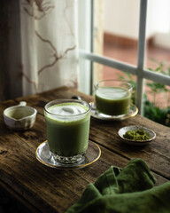 matcha latte through a window