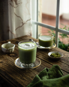 matcha latte through a window