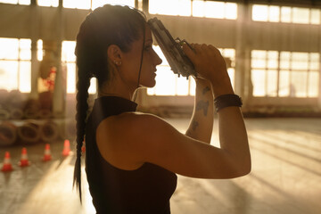 Lara Croft Tomb Raider action movie  cosplay costume photoshoot with guns and weapons brunette female model  - obrazy, fototapety, plakaty