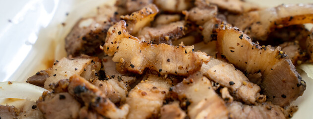 Delicious Taiwanese salted pork food with onion in restaurant.