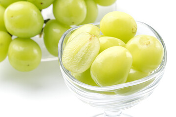 Beautiful boxed Shine Muscat green grape isolated on white background.