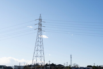 Tall transmission tower in a rural village, Japan