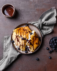  tasty pancakes with bananas, blueberry and chocolate