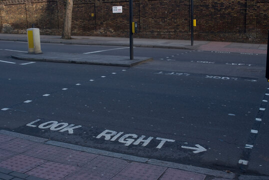 High angle view of road marking Look right.