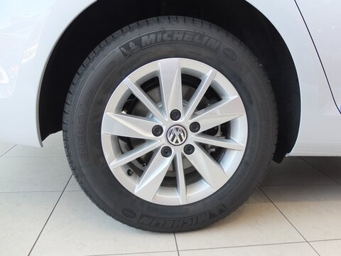 Jõhvi, Estonia 5.04.2018 - Car Showroom.  Aluminum wheel with Michelin Energy Saver   Tire. Wolksvagen logo.