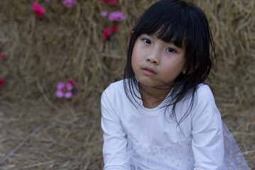 Portrait Asian Thailand kids cute little girl In white dress	