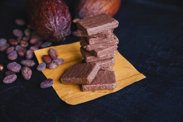 .Chocolate and Cocoa Beans with Cocoa On a black background