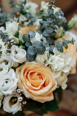 Wedding bouquet close-up of white and pink roses