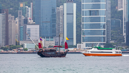 Fototapeta na wymiar Junk Boat at Victoria Harbour in Hong Kong