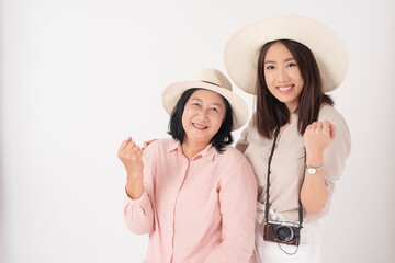 Asian older woman and her daughter on white background, Travel concept