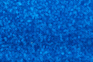Defocused Natural Glitter Lights Bokeh. Abstract Pattern Blue Sea Navy Texture Background
