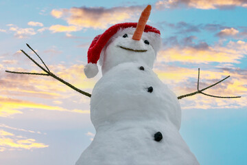 Funny snowman  on sky background