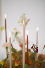 table setting for autumn wedding with candles