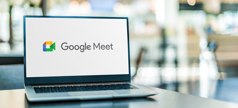 Laptop computer displaying logo of Google Meet