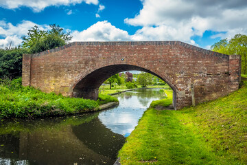 Fototapeta na wymiar A view of the Chesterfield canal bridge next to the Manton railway viaduct in Nottinghamshire, UK in springtime