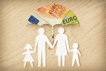 Paper family silhouette with umbrella made of euro banknotes on wooden background - Concept of family financial protection - 403808098