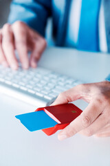 man and credit card in a payment terminal