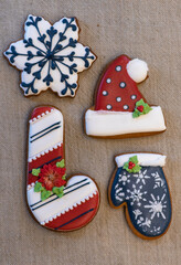 Christmas gingerbread cookies on a linen tablecloth.