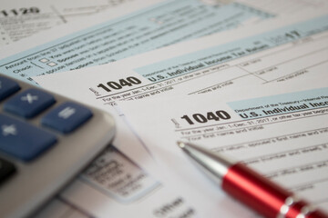 U.S. Individual income tax return. tax form 1040. Tax form business financial concept