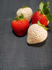 White strawberries and red strawberries