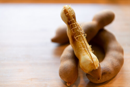 Sweet tamarind near ripe Thai fruit that tastes sweet and sour.