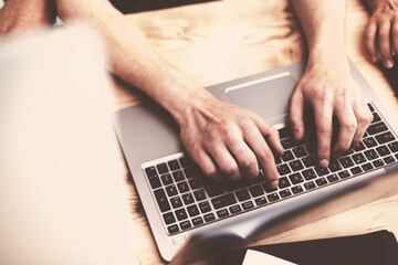 Fototapeta na wymiar close up. modern man typing on laptop.