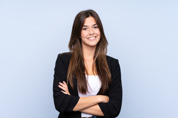 Young Brazilian business woman over isolated blue background laughing
