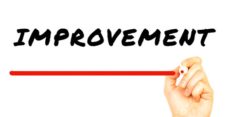 Hand writing IMPROVEMENT with red marker. Isolated on white background.
