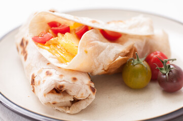 egg, cheese and tomato wrap
