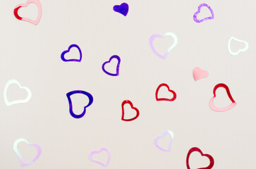 Festive romantic background of hearts of different colors
