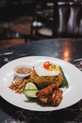 A plate of fried rice in a restaurant