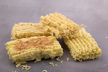 dried instant noodles, isolated on gray background.