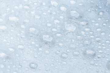 Foam bubble from soap or shampoo for washing isolated on white background from above