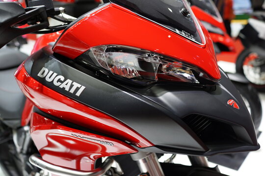 Close up elegant Ducati logo sign on motorcycle display in exhibition hall. Ducati Motor is the motorcycle-manufacturing division of Italian company. BANGKOK, THAILAND - 6 APR 2019.