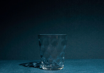 Glass of water with shadow and reflect