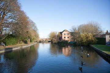 Fototapeta na wymiar Views of the canal from Newbury Lock in West Berkshire in the United Kingdom